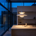 Halden pendant light over a kitchen island at dusk
