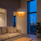 Solera pendant light in a living room at dusk