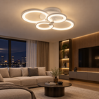 White overlapping multi-ring LED ceiling light on a living room ceiling