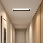 Recessed linear LED spotlight in a hallway ceiling