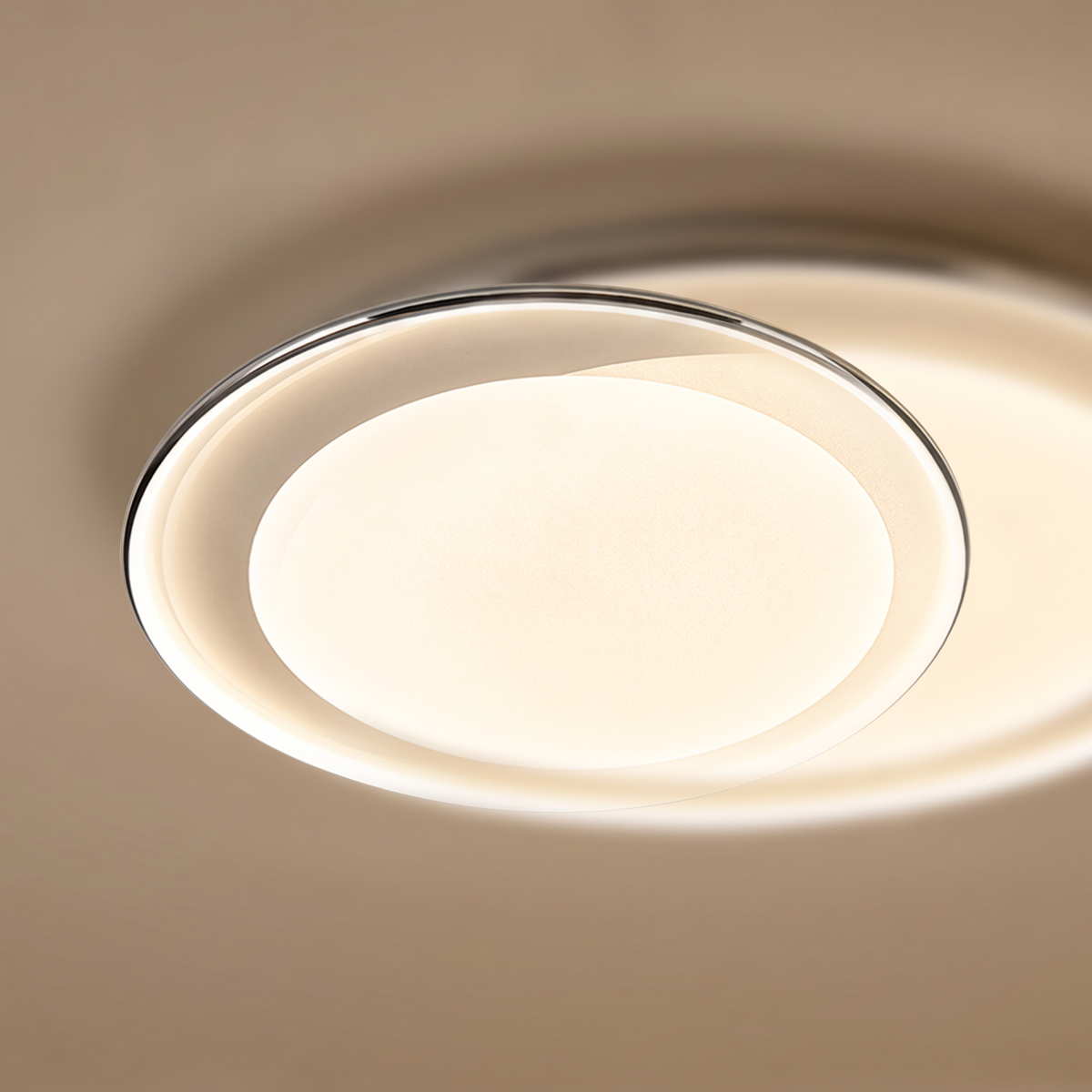 Calma round LED flush mount ceiling light close-up detail lit up