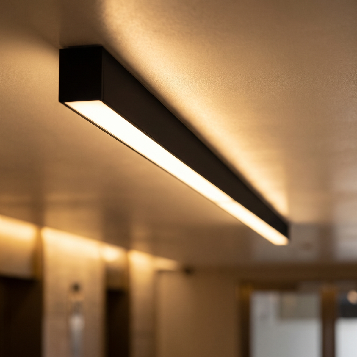 Stria linear LED bar flush mount ceiling light close-up detail lit up