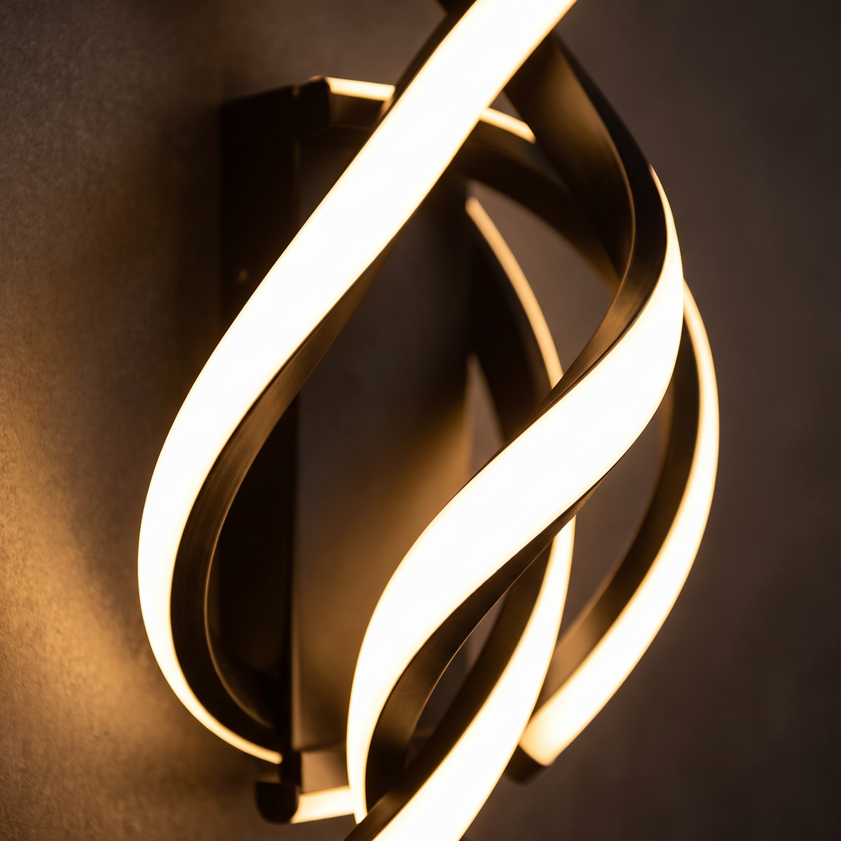 Coil spiral LED wall sconce close-up detail lit up