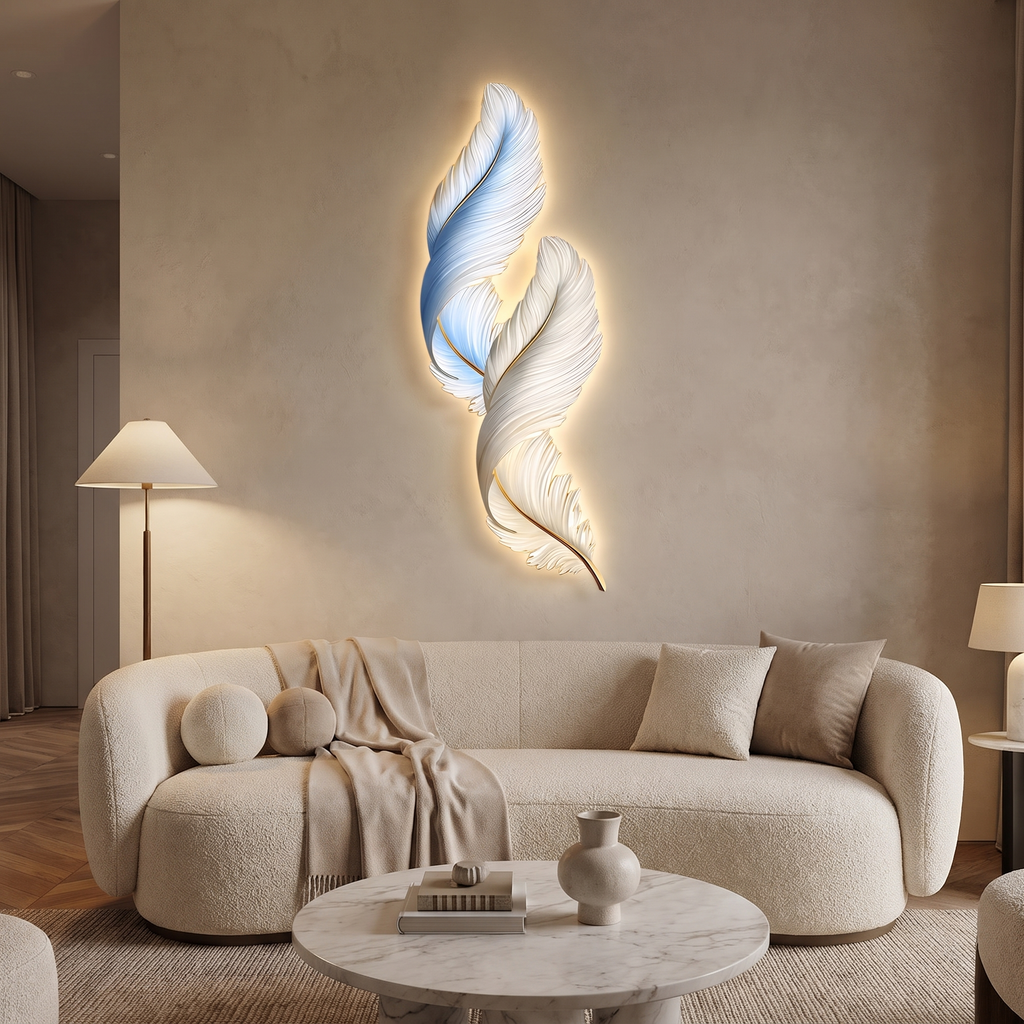 Plumage backlit feather LED wall decor light mounted on the wall above a curved sofa in a chic living room with neutral tones