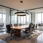 Orbis LED ring pendant light hangs over a meeting table in a modern conference room with glass walls and ergonomic chairs