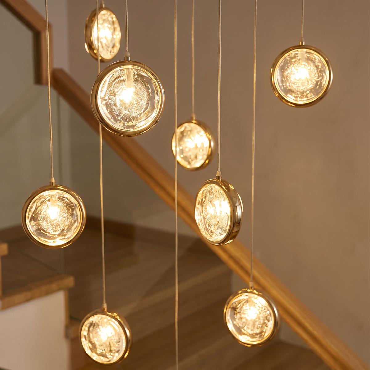 Cascade long crystal globe staircase chandelier close-up detail lit up